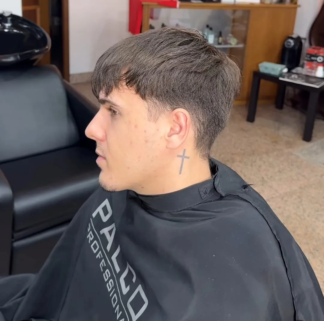 Short fade, straight razor outline
