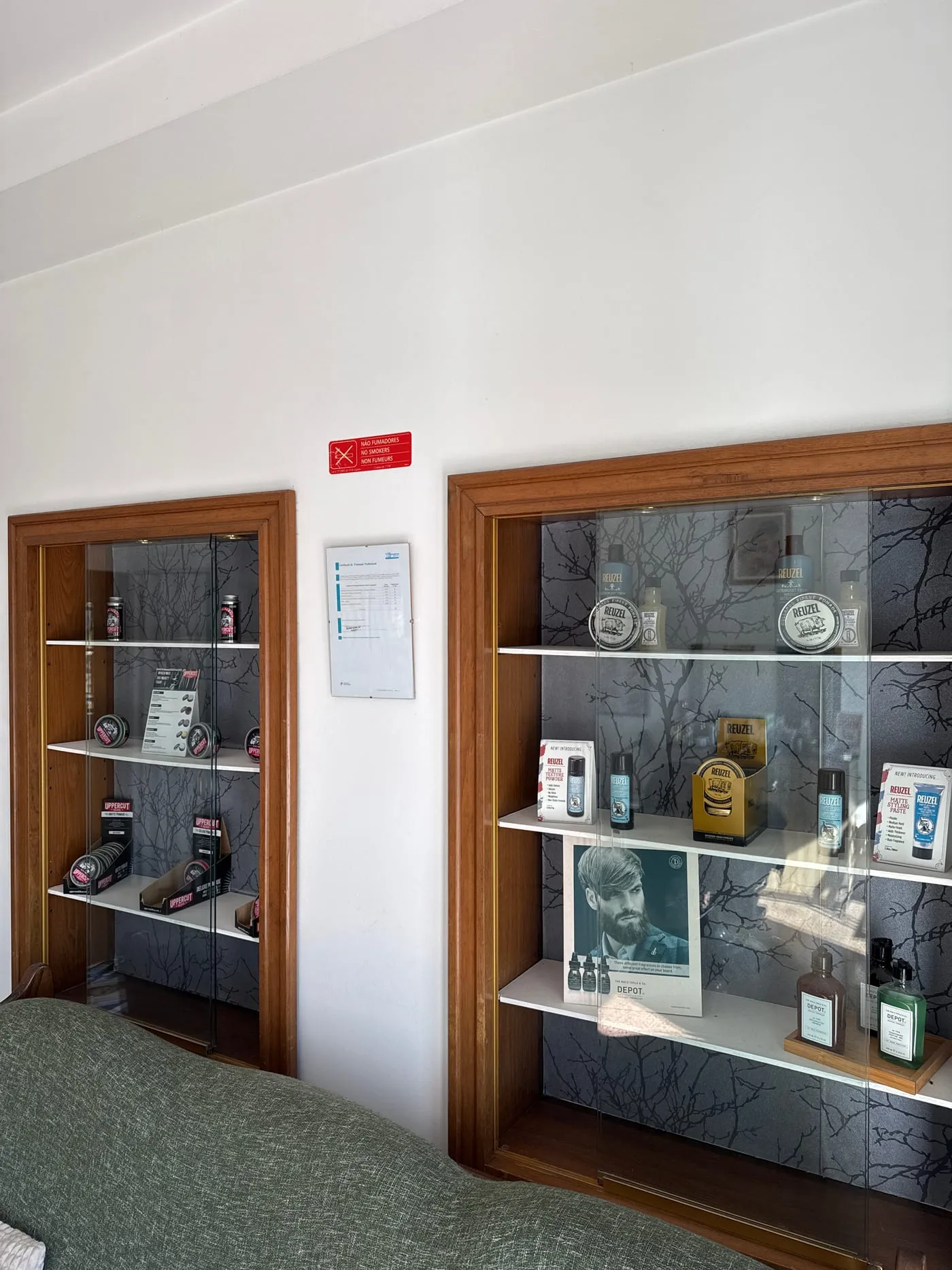 The shelf with the products the shop uses and sells.